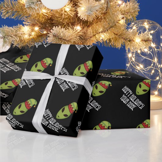 Groene buitenaardse elf met zwarte kerst cadeaupapier (Feestdagen)