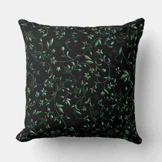 Groene dampen op zwart kussen