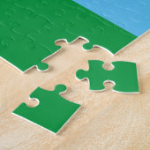 Groene dinosaurus houdt van voetbal legpuzzel (Zijkant)