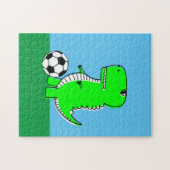 Groene dinosaurus houdt van voetbal legpuzzel (Horizontaal)