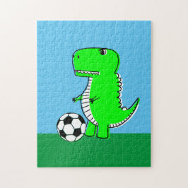 Groene dinosaurus houdt van voetbal legpuzzel