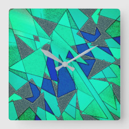 Groene driehoekige sneeuw op blauwe achtergrond, r vierkante klok