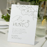 Groene elegante bloemenring hunt vrijgezellenfeest reclamebord met voetstuk<br><div class="desc">Vermaak uw gasten met dit leuke ringjacht vrijgezellenfeest ringspel, beschikt over elegante delicate handgetekende bloemenillustratie en moderne scripttypografische details, in donkere salie groen en witte kleur, eenvoudig en romantisch. geweldige activiteit voor modern rustiek vrijgezellenfeest, country tuin bruiloft en eenvoudige boho bruiloftsfeesten in de zomer en de winter. Volledig aanpasbaar met...</div>