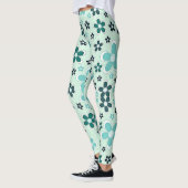 Groene en blauwe bloem op lichtgroene achtergrond leggings (Links)