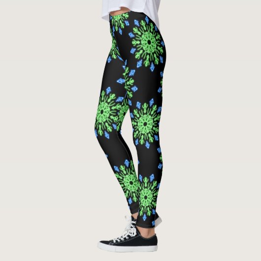 Groene en blauwe neonbloem leggings (Links)