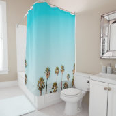 GROENE EN BROEIENDE PALMBOMEN ONDER DUIDELIJKE BLA DOUCHEGORDIJN (In situ)