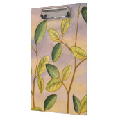 Groene en gele bladeren op zonnescherm klembord (Links)