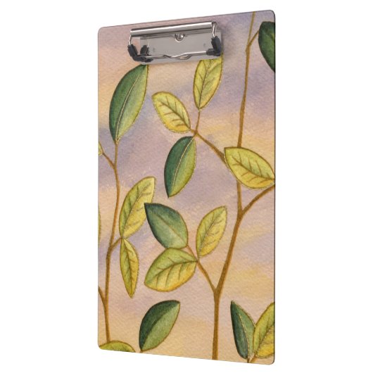 Groene en gele bladeren op zonnescherm klembord (Links)