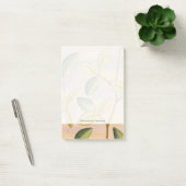 Groene en gele bladeren op zonnescherm post-it® notes (Kantoor)