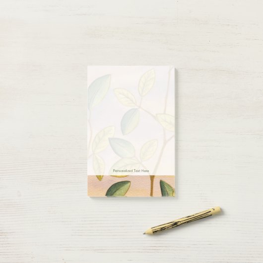 Groene en gele bladeren op zonnescherm post-it® notes (Op bureau)