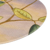 Groene en gele bladeren op zonnescherm snijplank (Hoek)