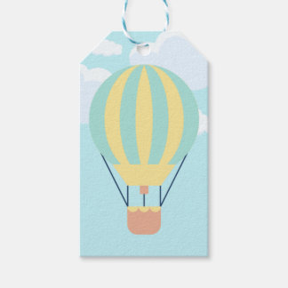 Groene en gele hete luchtballon in de lucht cadeaulabel