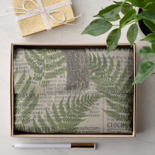 Groene en gele papegaai op bladenontkoppeling tissuepapier (Geschenk)