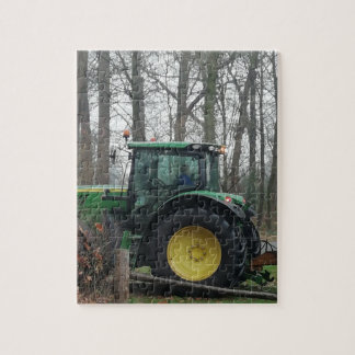 Groene en gele tractor. legpuzzel