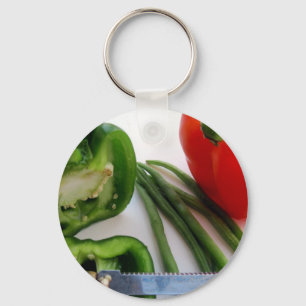 Groene en rode paprika's met bonen sleutelhanger
