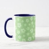 Groene en witte bloemen theebeker met blauw handva mok (Links)