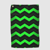 Groene en zwarte accessoire op heldergroen golfhanddoek (Voorkant)