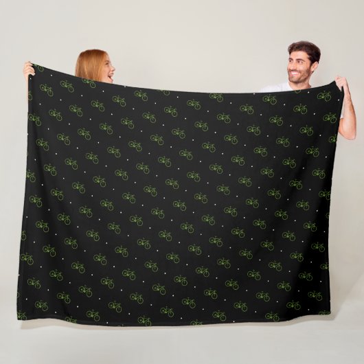 Groene fietsen op zwart fleece deken (In situ)