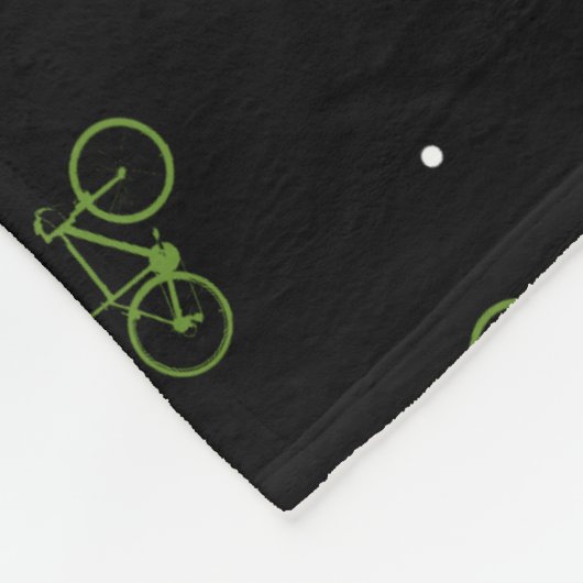 Groene fietsen op zwart fleece deken (Hoek)