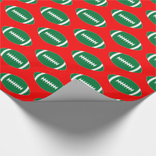 Groene Footballs op de rode achtergrond met kerstc Cadeaupapier
