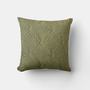 Groene gebreide stof: close-up textuur kussen