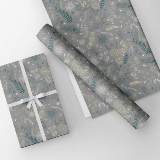 Groene, gele en witte bloemendoodles in grijs. inpakpapier vel