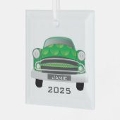 Groene gemiddelde van een auto die een kind is met glas ornament (Voorkant links)