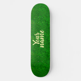 Groene gras textuur van een voetbalveld persoonlijk skateboard