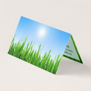 Groene gras tuin met blauwe lucht ontwerp visitekaartje