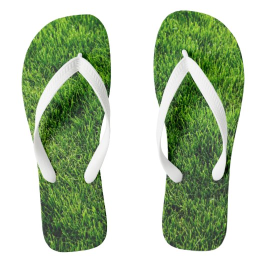 Groene grastextuur van een voetbalveld teenslippers (Voetbed)