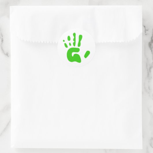 Groene handdruk ronde sticker (Tas)
