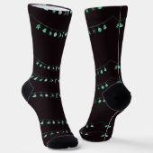 Groene hangende kerstversieringen op bruine socket sokken (Gebogen)