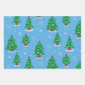 Groene kerstbomen met vallende sneeuw op blauw inpakpapier vel (Voorkant 3)