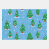 Groene kerstbomen met vallende sneeuw op blauw inpakpapier vel (Voorkant 2)