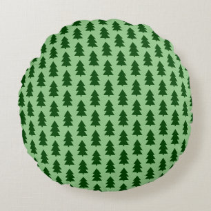 Groene kerstbomen rond kussen