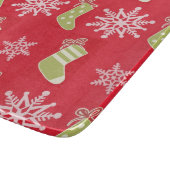 Groene kerstkousen en sneeuwvlokken snijplank (Hoek)