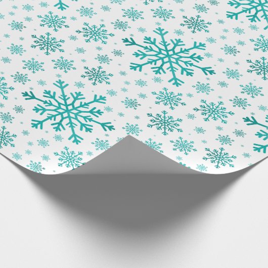 groene kerstsnowflakes op winterwit cadeaupapier (Hoek)