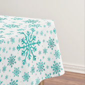 groene kerstsnowflakes op winterwit tafelkleed (Voorbeeld)
