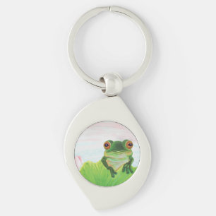 Groene kikker achter de sleutelhanger van het lant