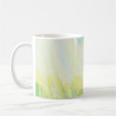 Groene kikker vangt sommige stralen koffiemok (Links)