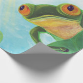 Groene kikker vangt zonneschermen cadeaupapier (Hoek)