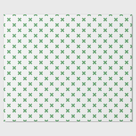 Groene kruisstiften op wit cadeaupapier (Vlak)