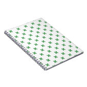 Groene kruisstiften op wit notitieboek (Rechterzijde)