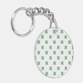 Groene kruisstiften op wit sleutelhanger (Voorkant Links)