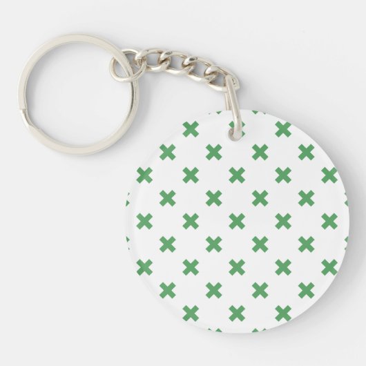 Groene kruisstiften op wit sleutelhanger (Voorkant)