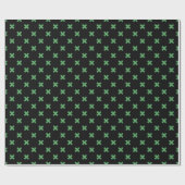 Groene kruisstiften op zwart cadeaupapier (Vlak)