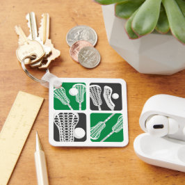 Groene Lacrosse Blokken van Stokken en Ballen Sleutelhanger