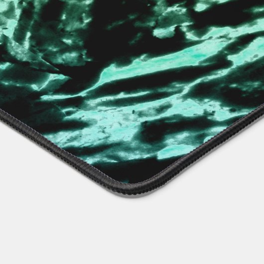 Groene marmer op zwart bureaumat (Hoek)