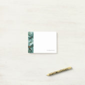 Groene marmertextuur met vinnen post-it® notes (Op bureau)