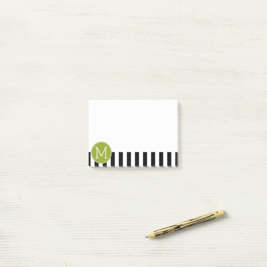 Groene monogram zwart-wit met strips post-it® notes (Op bureau)
